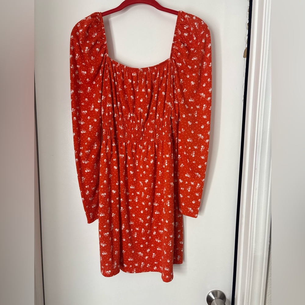 Cute summer orange long sleeve dress perfect for the beach’s breeze